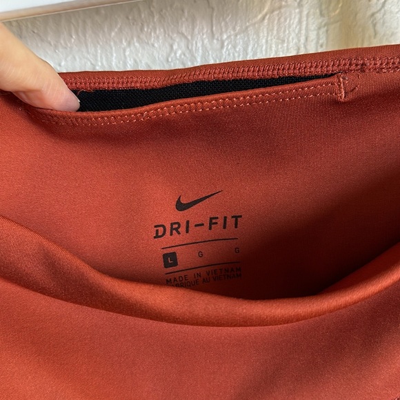 Nike leggings with side logo on the side leg size large NWOT. Burt/brick  color - Picture 4 of 5
